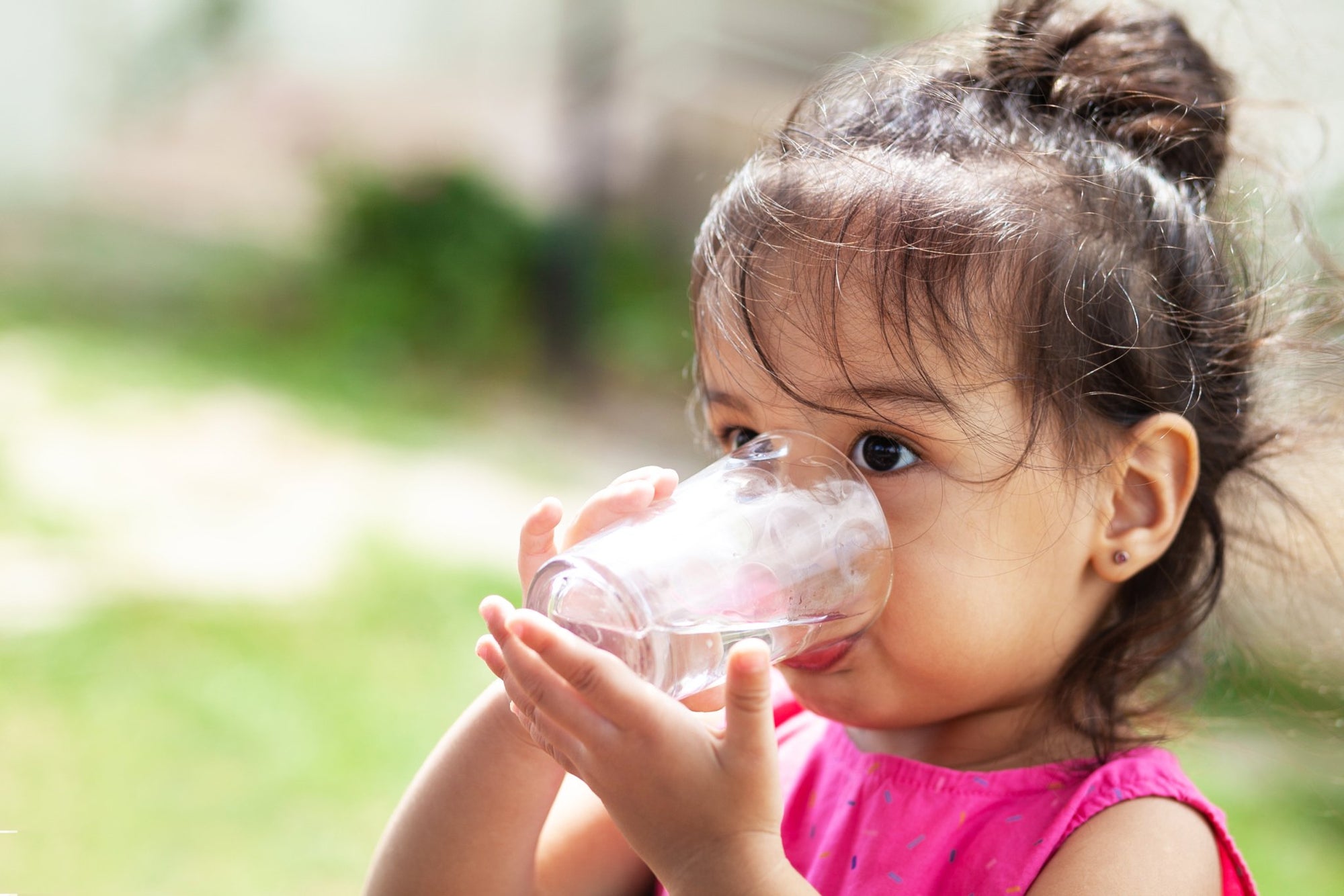 child drinking clean filtered water from home filterl  l'eau mor water filters louisiana 